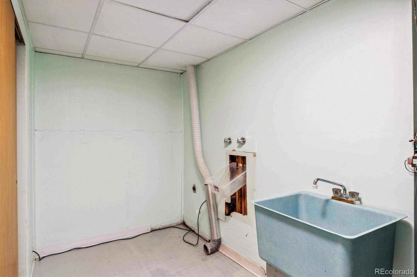 20 Rangeview Place Wheat Ridge, CO 80215 - Photo 17 of 49 a room with storage and utility