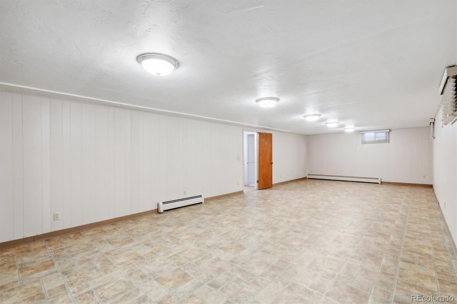 20 Rangeview Place Wheat Ridge, CO 80215 - Photo 25 of 49 an empty room with a empty space and windows
