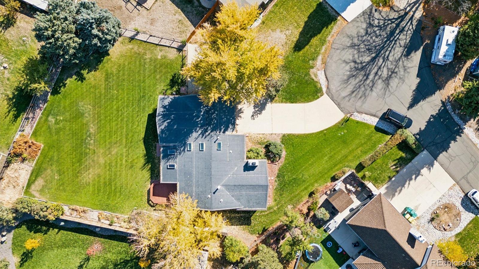 20 Rangeview Place Wheat Ridge, CO 80215 - Photo 49 of 49 an aerial view of a house with a yard swimming pool outdoor seating and yard