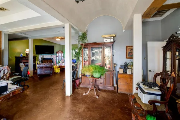 a view of a livingroom with furniture and furniture
