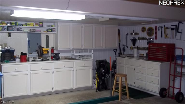 6466 State Road, Unit M4 Parma, OH 44134 - Photo 9 of 12 2 CAR ATTACHED GARAGE WITH ALOT OF CABINTRY!