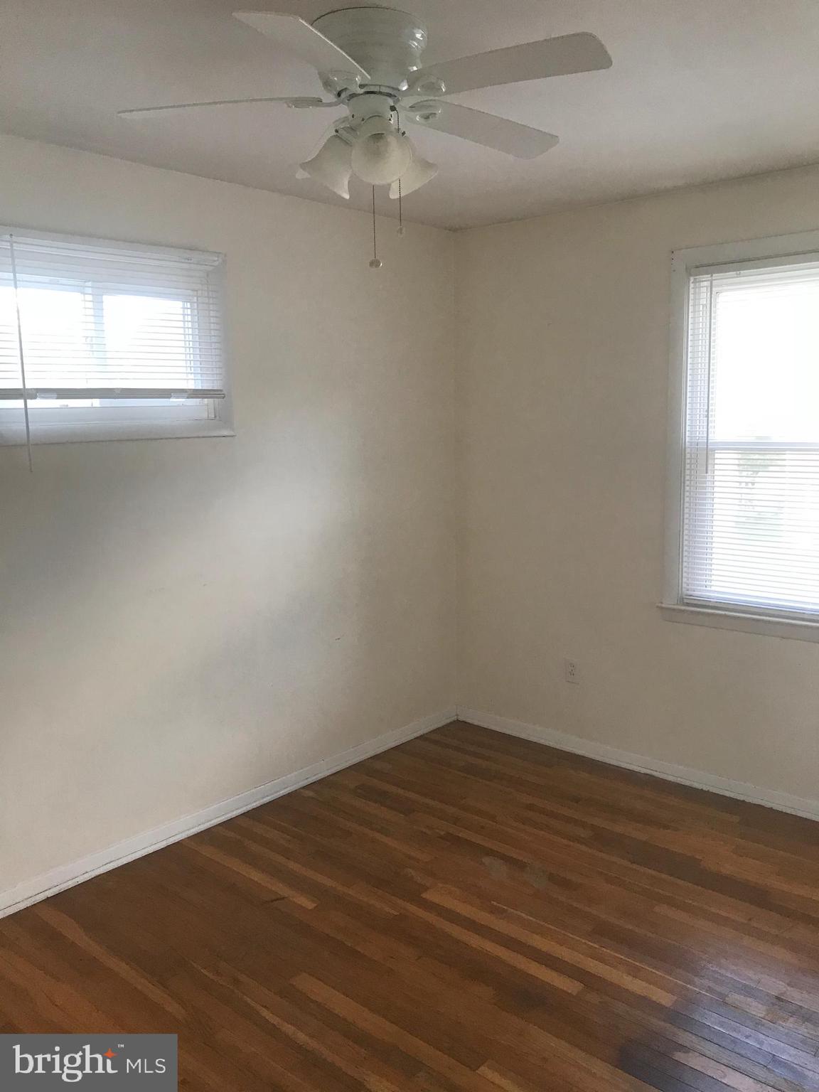 1645 Riverwood Road Baltimore, MD 21221 - Photo 8 of 24 Bedroom 2, hardwood floors, ceiling fan