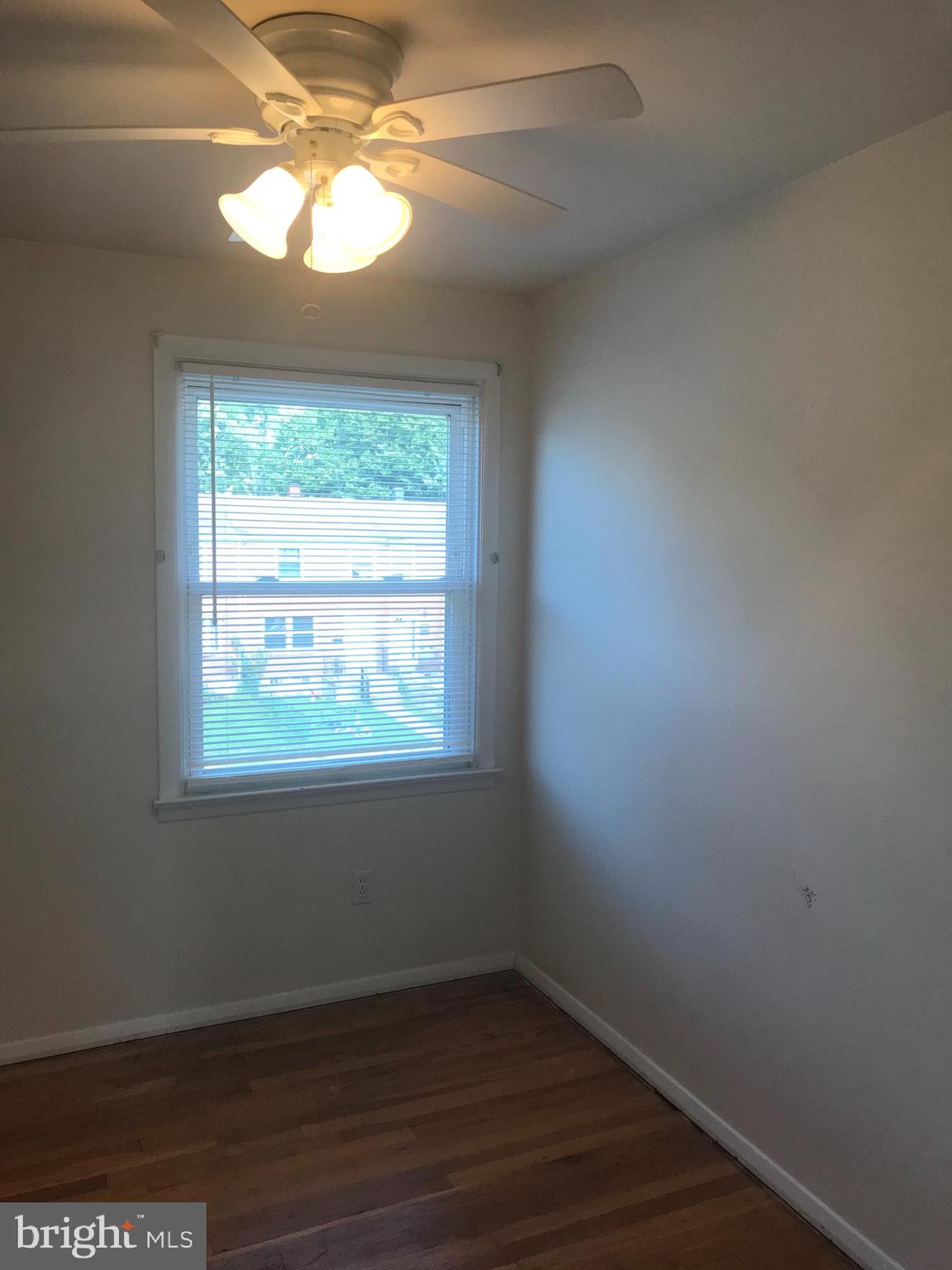 1645 Riverwood Road Baltimore, MD 21221 - Photo 9 of 24 Bedroom 3, hardwood floors, ceiling fan