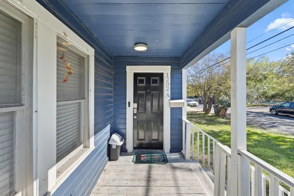a front view of a house with a porch