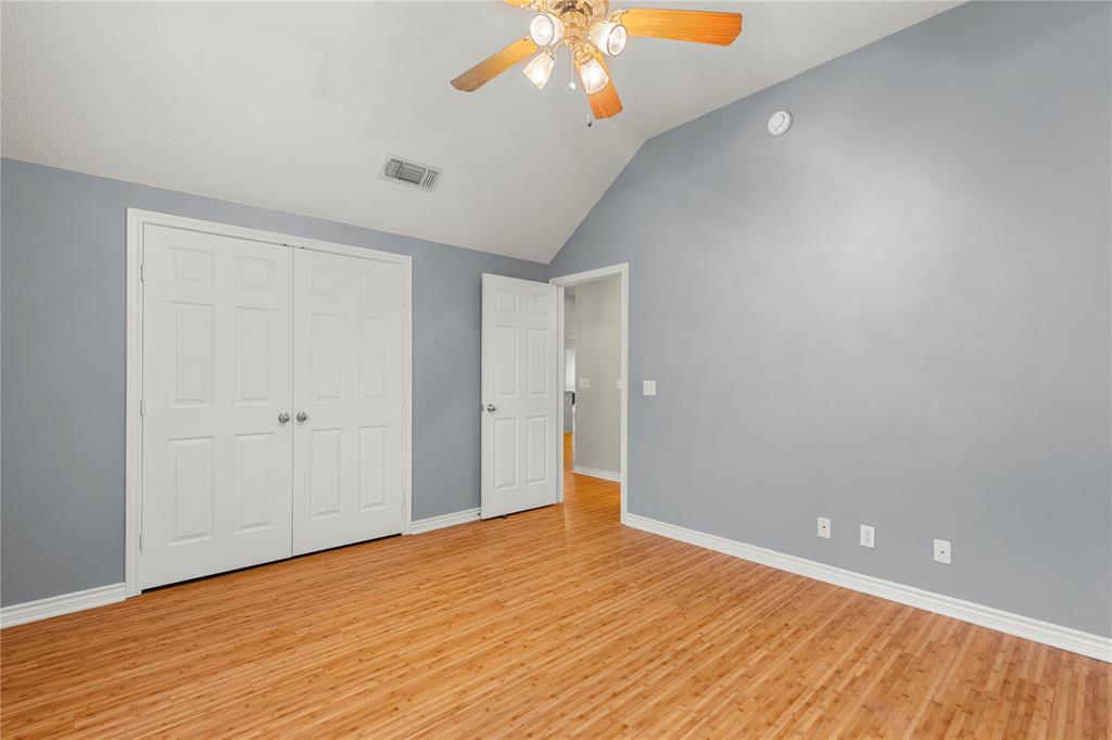 2917 Harlow Road Commerce, TX 75428 - Photo 26 of 40 a view of an empty room with wooden floor