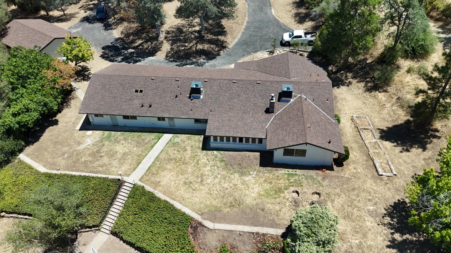 31612 Duke Road North Fork, CA 93643 - Photo 39 of 44 an aerial view of a house with a yard and trees