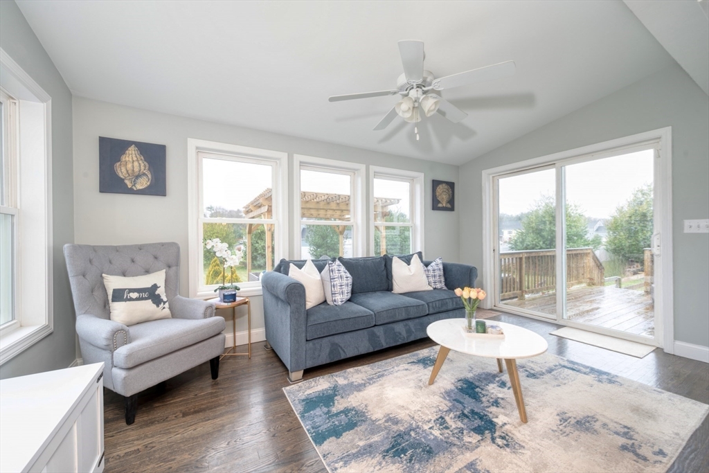 4 Sycamore Lane Bridgewater, MA 02324 - Photo 14 of 42 a living room with furniture and a large window