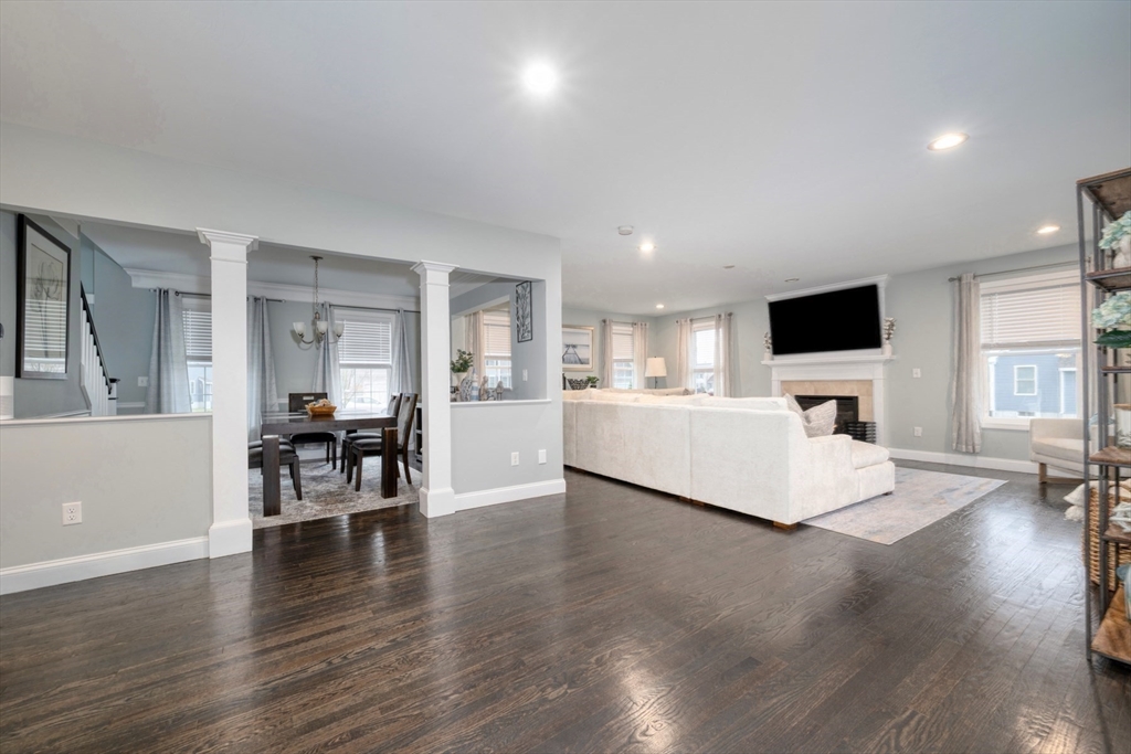 4 Sycamore Lane Bridgewater, MA 02324 - Photo 16 of 42 a living room with furniture and a flat screen tv