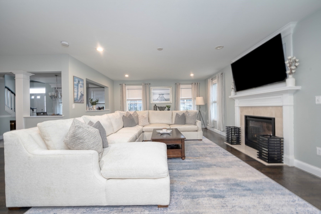 4 Sycamore Lane Bridgewater, MA 02324 - Photo 17 of 42 a living room with furniture fireplace and flat screen tv