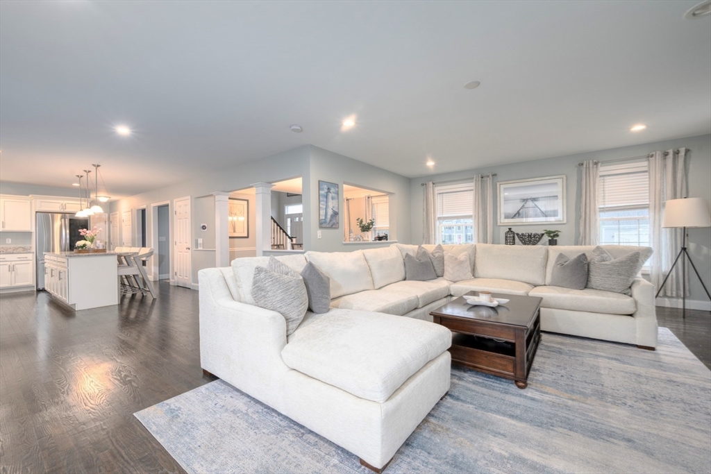 4 Sycamore Lane Bridgewater, MA 02324 - Photo 18 of 42 a living room with furniture and view of kitchen