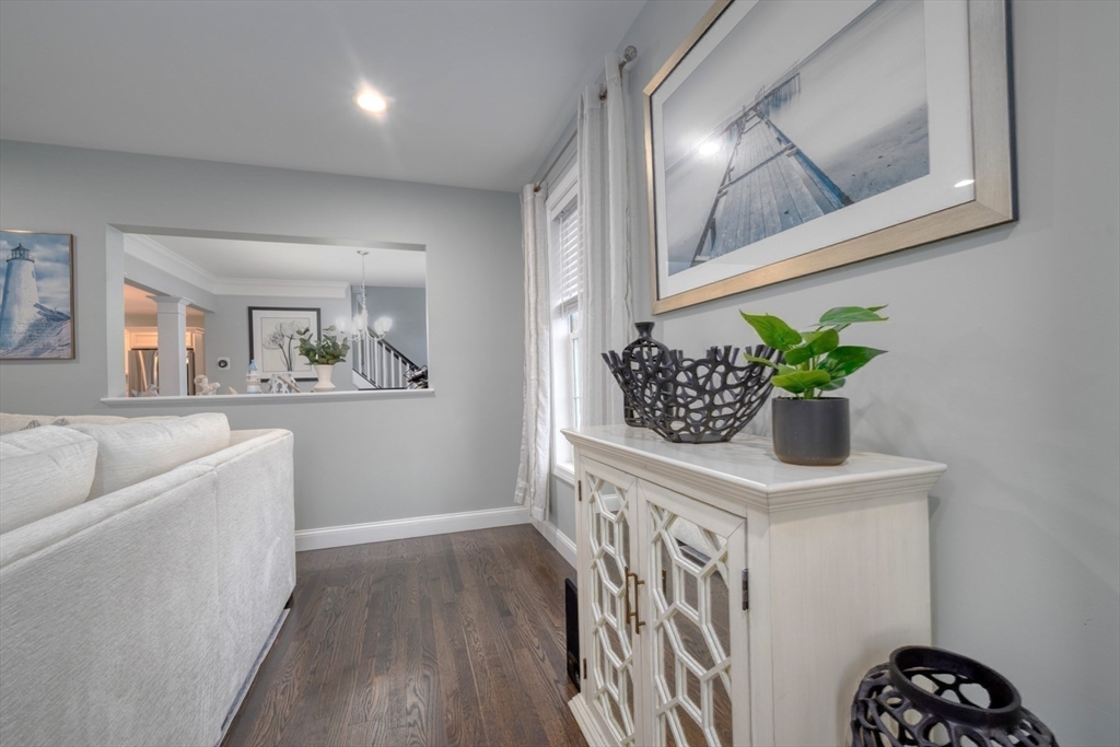 4 Sycamore Lane Bridgewater, MA 02324 - Photo 19 of 42 a view of a hallway to a livingroom with furniture