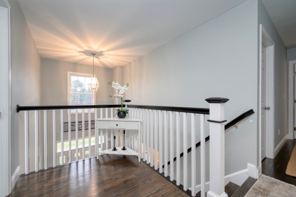 4 Sycamore Lane Bridgewater, MA 02324 - Photo 22 of 42 a view of entryway and hall with wooden floor