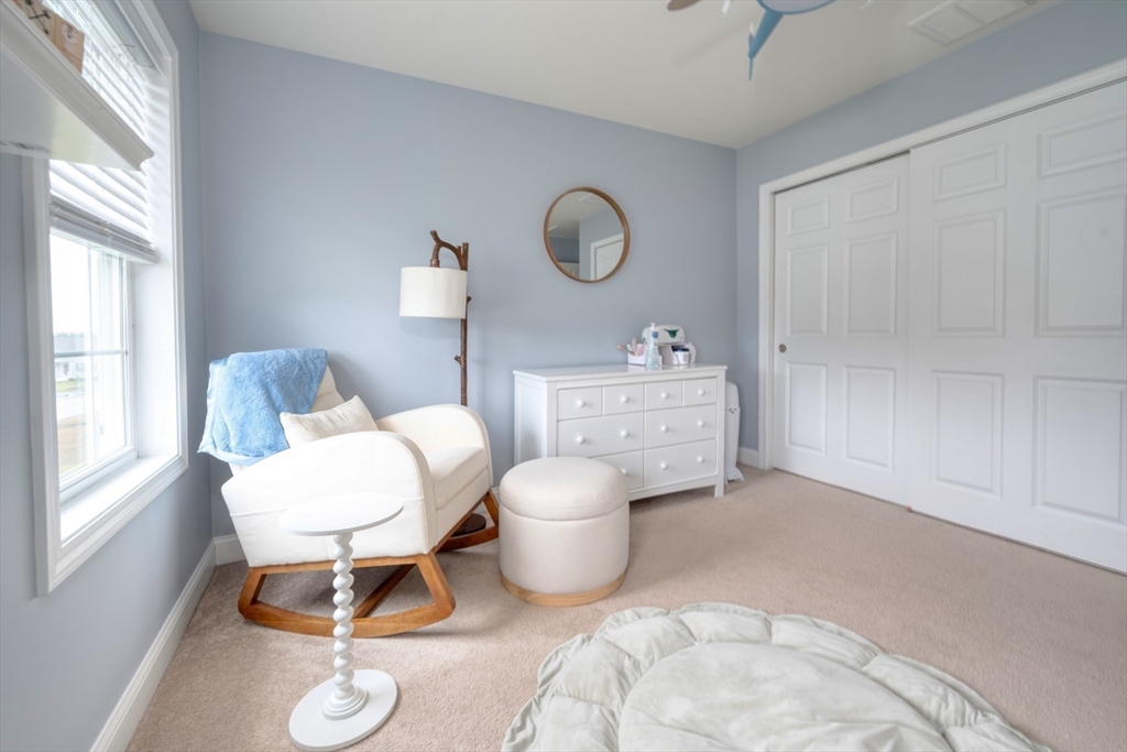 4 Sycamore Lane Bridgewater, MA 02324 - Photo 28 of 42 a living room with furniture and a window