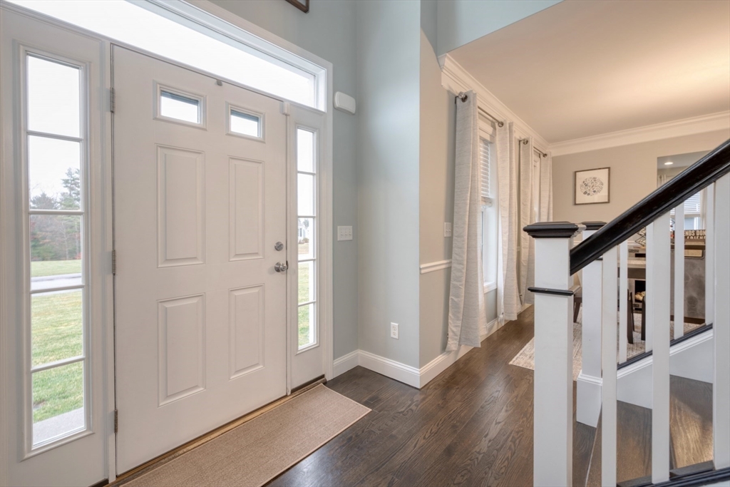 4 Sycamore Lane Bridgewater, MA 02324 - Photo 4 of 42 a view of an entryway with wooden floor