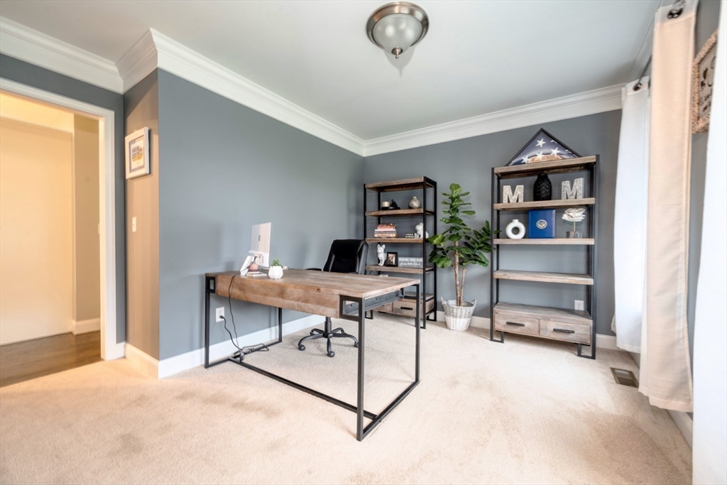 4 Sycamore Lane Bridgewater, MA 02324 - Photo 6 of 42 a view of a livingroom with furniture and a window