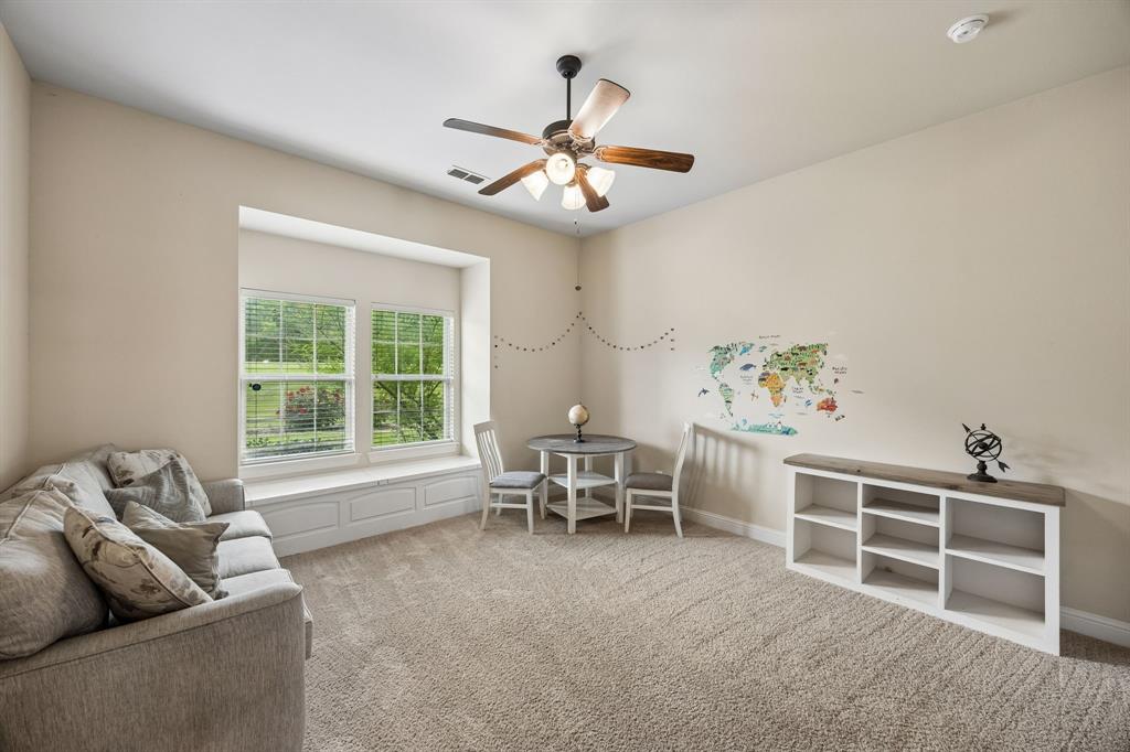 62 Trail Ridge Drive Melissa, TX 75454 - Photo 20 of 39 Guest bedroom #2 located downstairs has an ensuite bathroom with large walk-in closet and built-ins