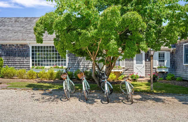 front view of a house with a backyard
