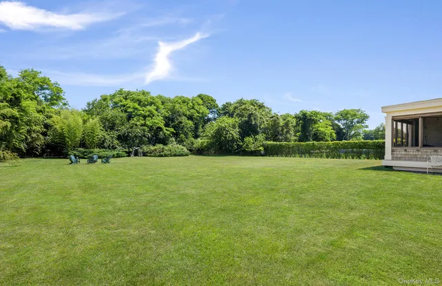 a view of a garden and basketball court
