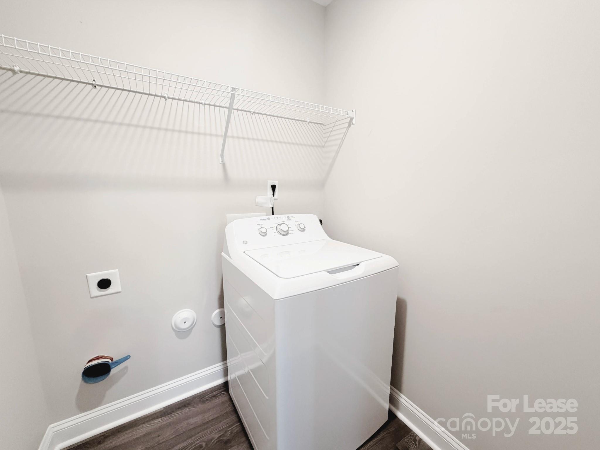 921 Pineridge Street Southeast Concord, NC 28025 - Photo 6 of 13 a utility room with dryer and washer