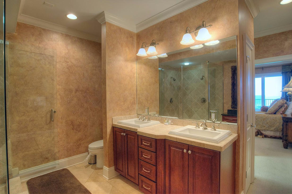 2421 West County Highway 30A, Unit C201 Santa Rosa Beach, FL 32459 - Photo 20 of 50 a bathroom with a sink a toilet and shower