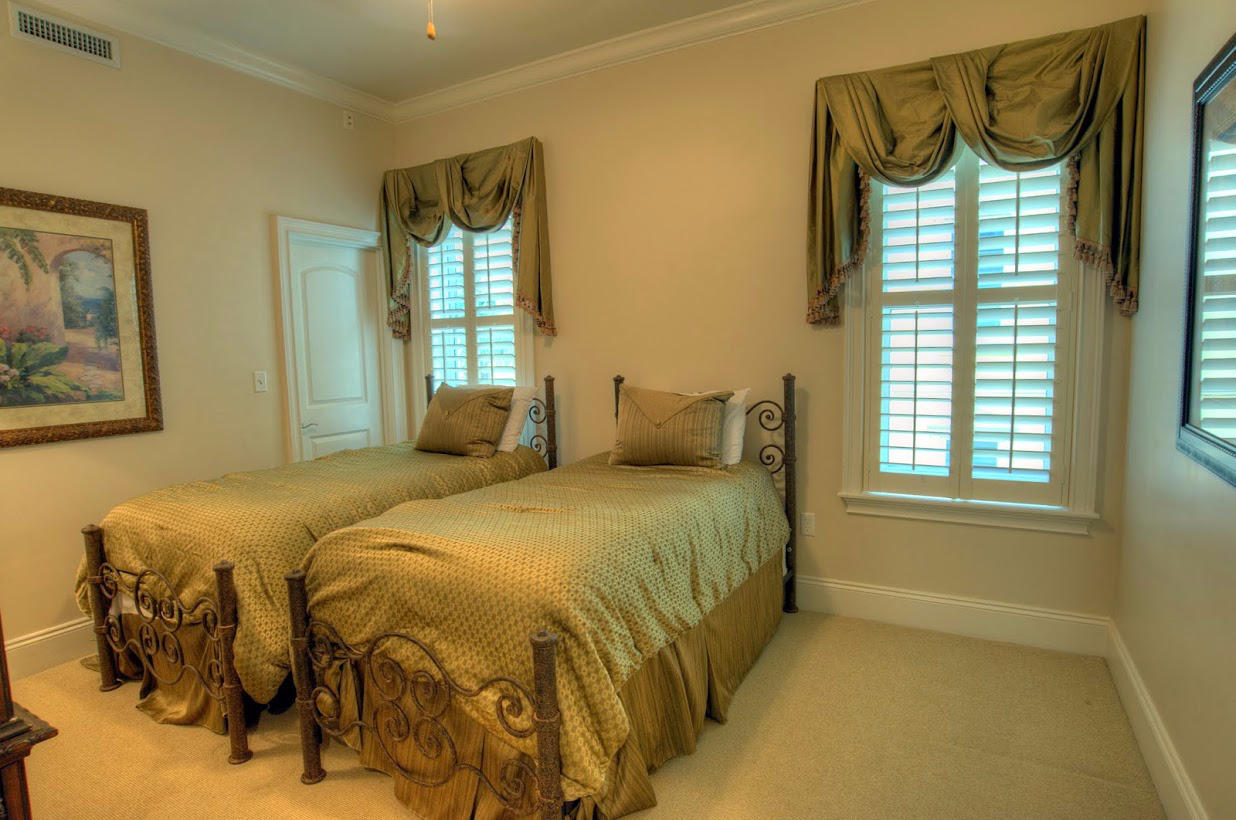 2421 West County Highway 30A, Unit C201 Santa Rosa Beach, FL 32459 - Photo 21 of 50 a bedroom with a bed and a window