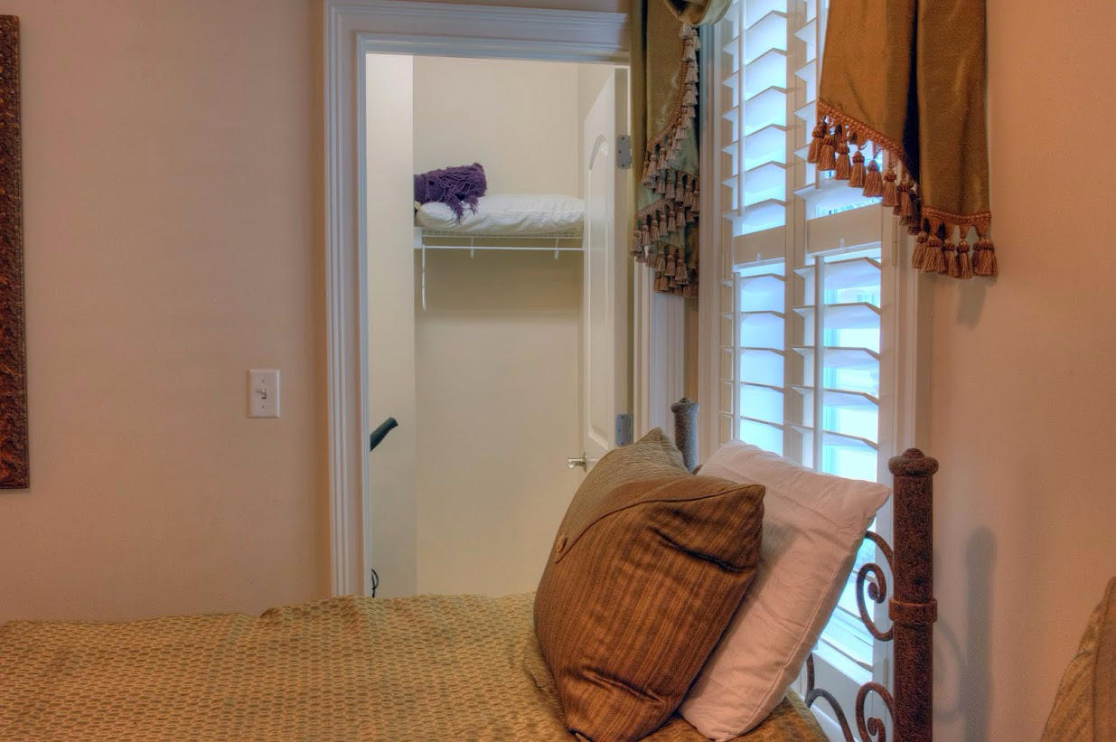 2421 West County Highway 30A, Unit C201 Santa Rosa Beach, FL 32459 - Photo 22 of 50 a bedroom with a bed and a window