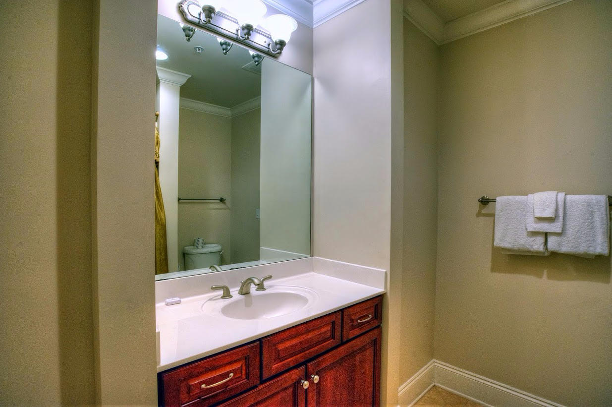 2421 West County Highway 30A, Unit C201 Santa Rosa Beach, FL 32459 - Photo 28 of 50 a bathroom with a sink and a mirror