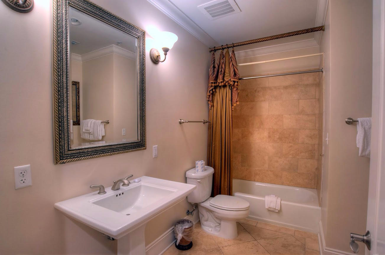 2421 West County Highway 30A, Unit C201 Santa Rosa Beach, FL 32459 - Photo 29 of 50 a bathroom with a sink toilet and shower