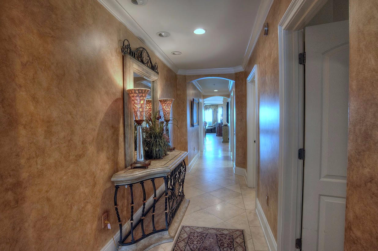 2421 West County Highway 30A, Unit C201 Santa Rosa Beach, FL 32459 - Photo 3 of 50 a view of a hallway with wooden floor and stairs