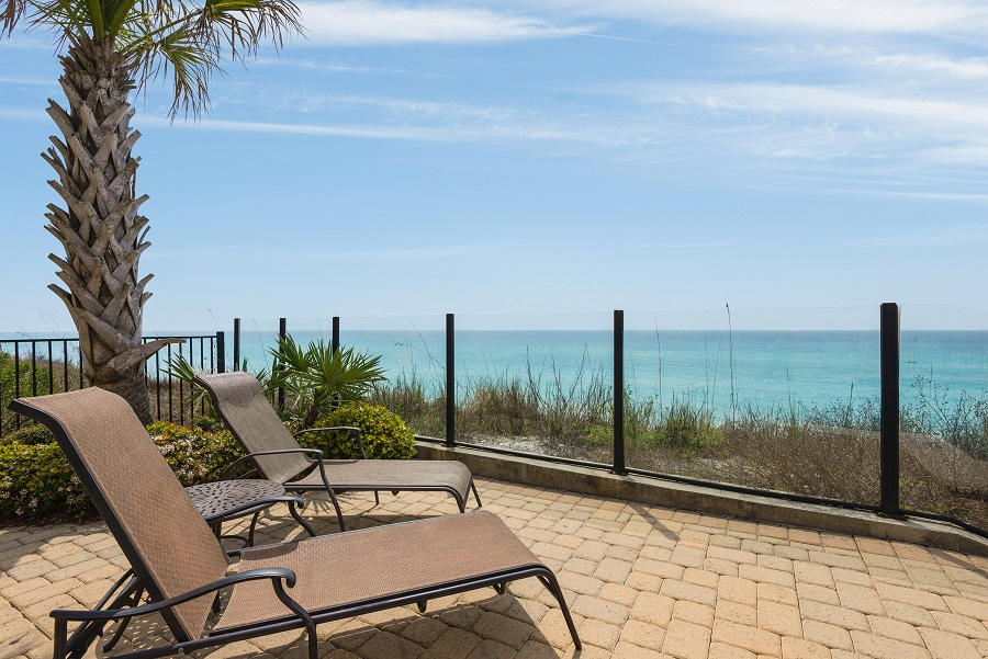 2421 West County Highway 30A, Unit C201 Santa Rosa Beach, FL 32459 - Photo 43 of 50 a view of a terrace with furniture and garden