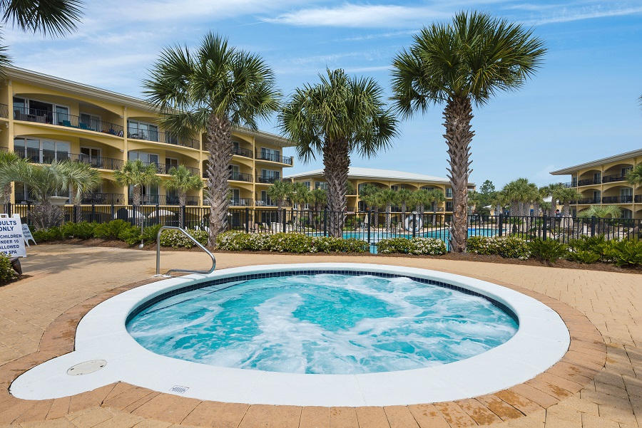2421 West County Highway 30A, Unit C201 Santa Rosa Beach, FL 32459 - Photo 44 of 50 a view of a swimming pool with a patio and a yard
