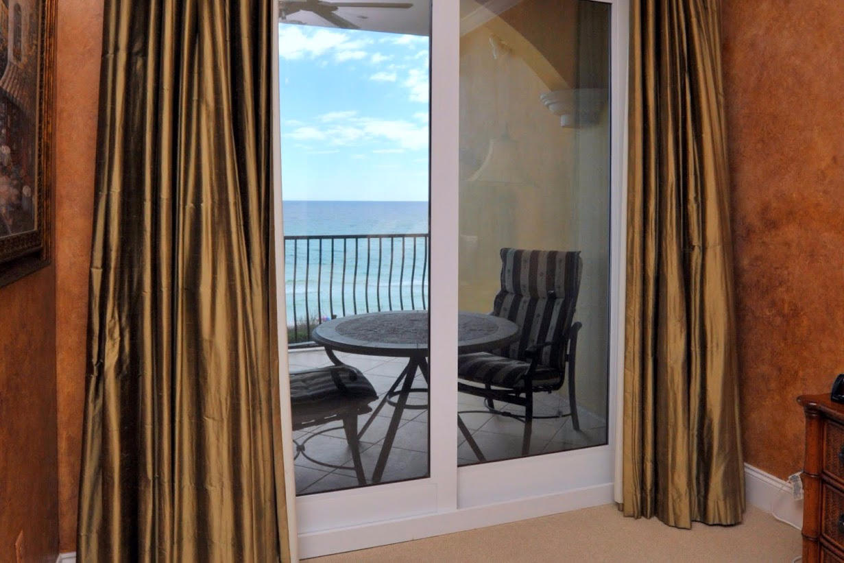 2421 West County Highway 30A, Unit C201 Santa Rosa Beach, FL 32459 - Photo 10 of 50 a view of a outdoor space with furniture and front door