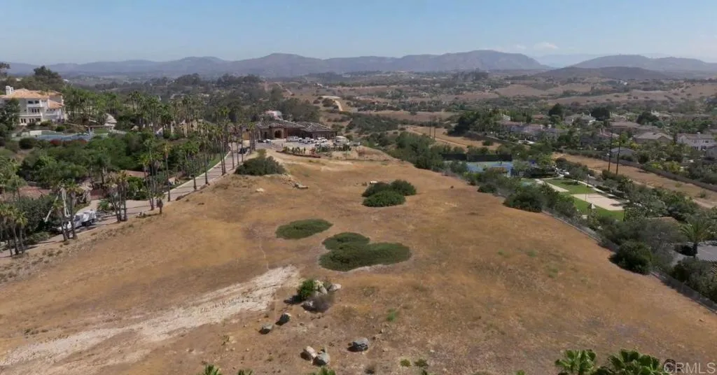 0 Spyglass Lane Rancho Santa Fe, CA 92067 - Photo 16 of 22 a view of a town with mountains in the background