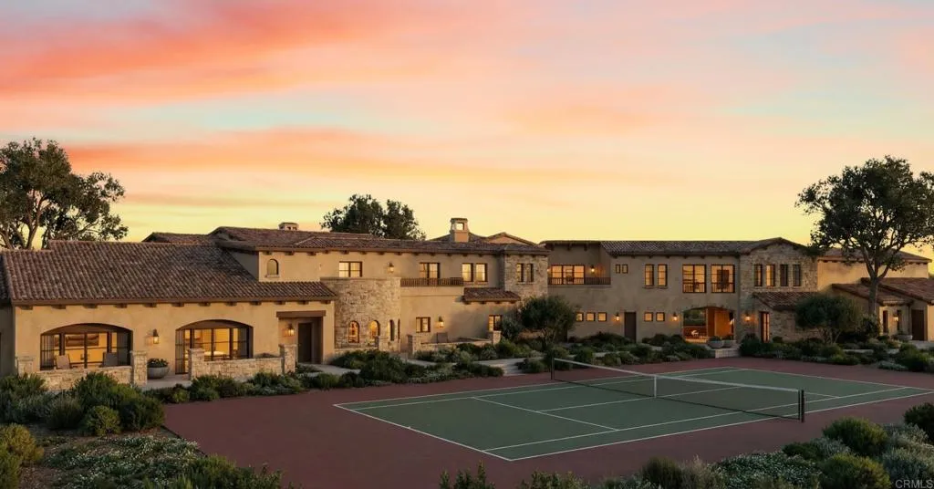 0 Spyglass Lane Rancho Santa Fe, CA 92067 - Photo 2 of 22 a front view of a residential apartment building with a yard