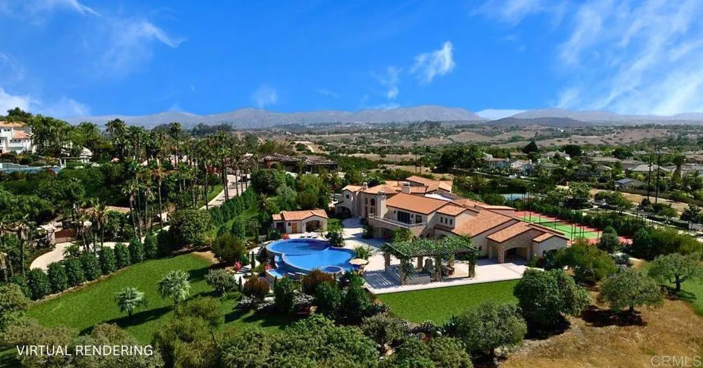 0 Spyglass Lane Rancho Santa Fe, CA 92067 - Photo 6 of 22 a view of a city with lawn chairs under an umbrella