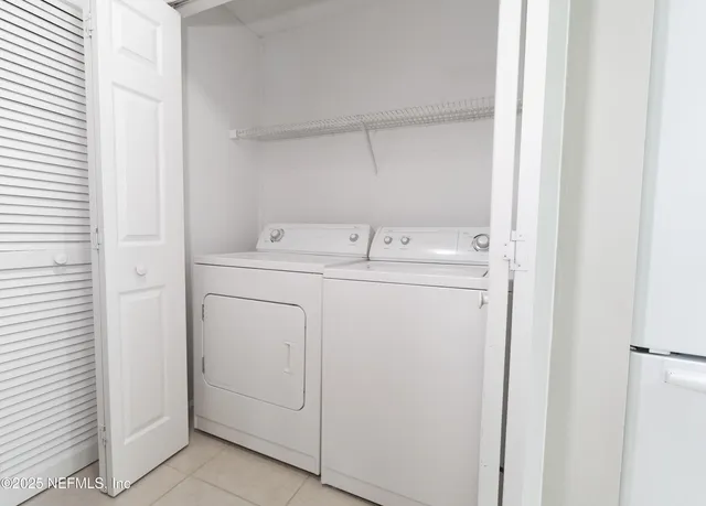 a view of a balcony with wooden floor