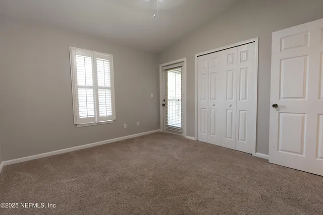 an empty room that has a window