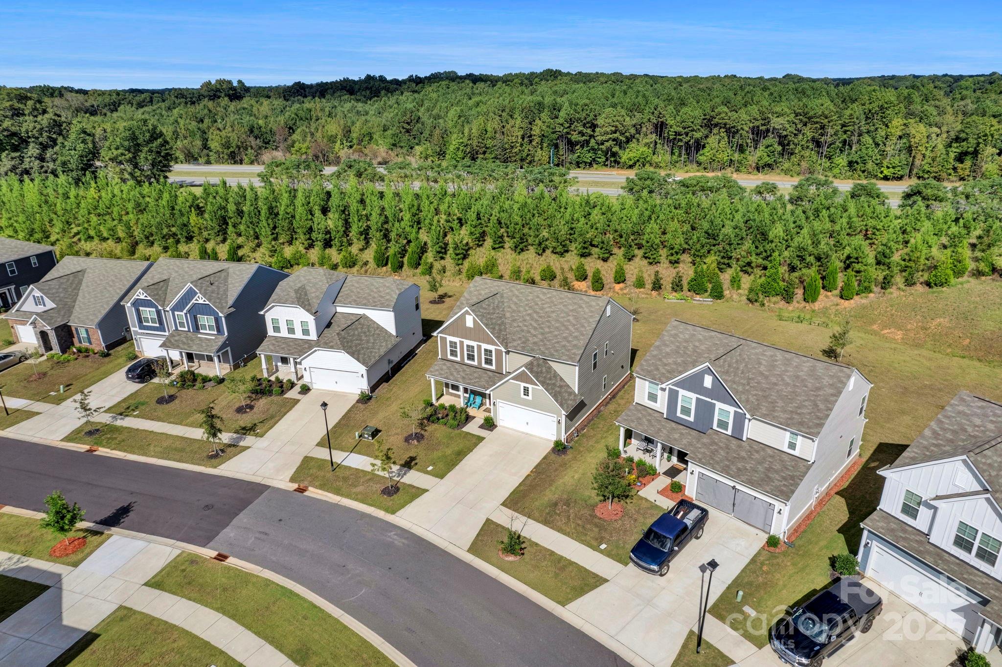 2712 Trinity Street Monroe, NC 28110 - Photo 2 of 48 an aerial view of a house with a yard