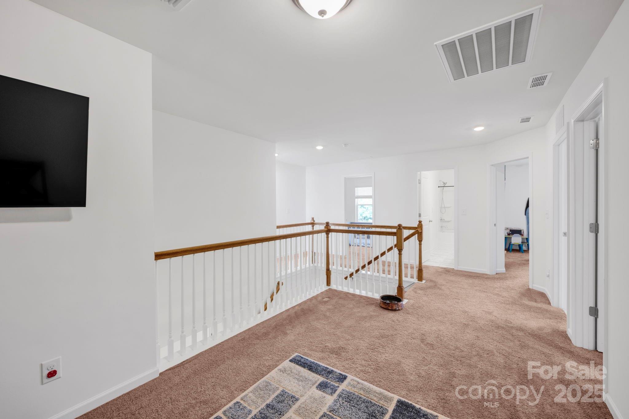 2712 Trinity Street Monroe, NC 28110 - Photo 22 of 48 a view of an empty room with windows