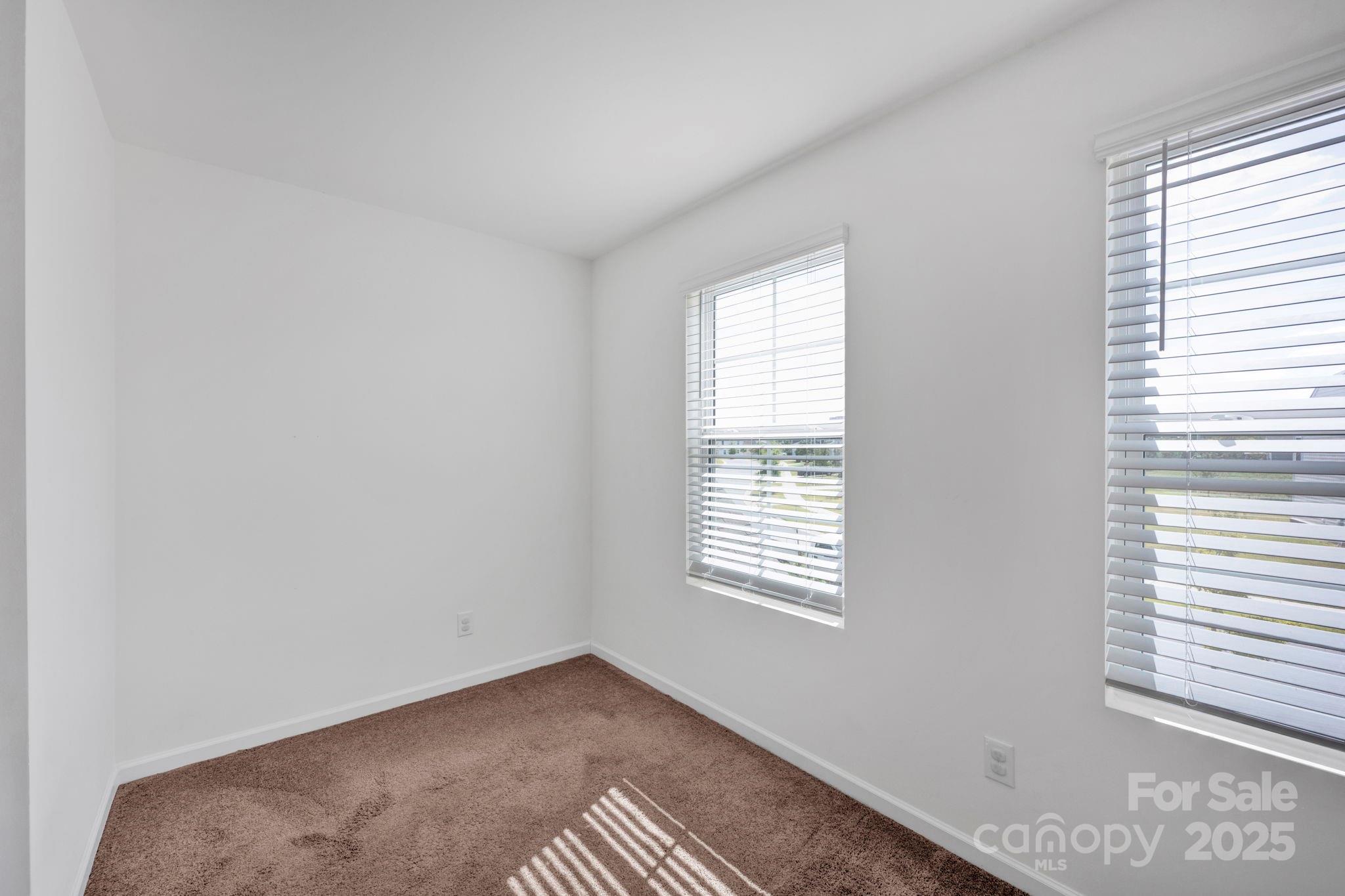 2712 Trinity Street Monroe, NC 28110 - Photo 31 of 48 a view of an empty room with a window