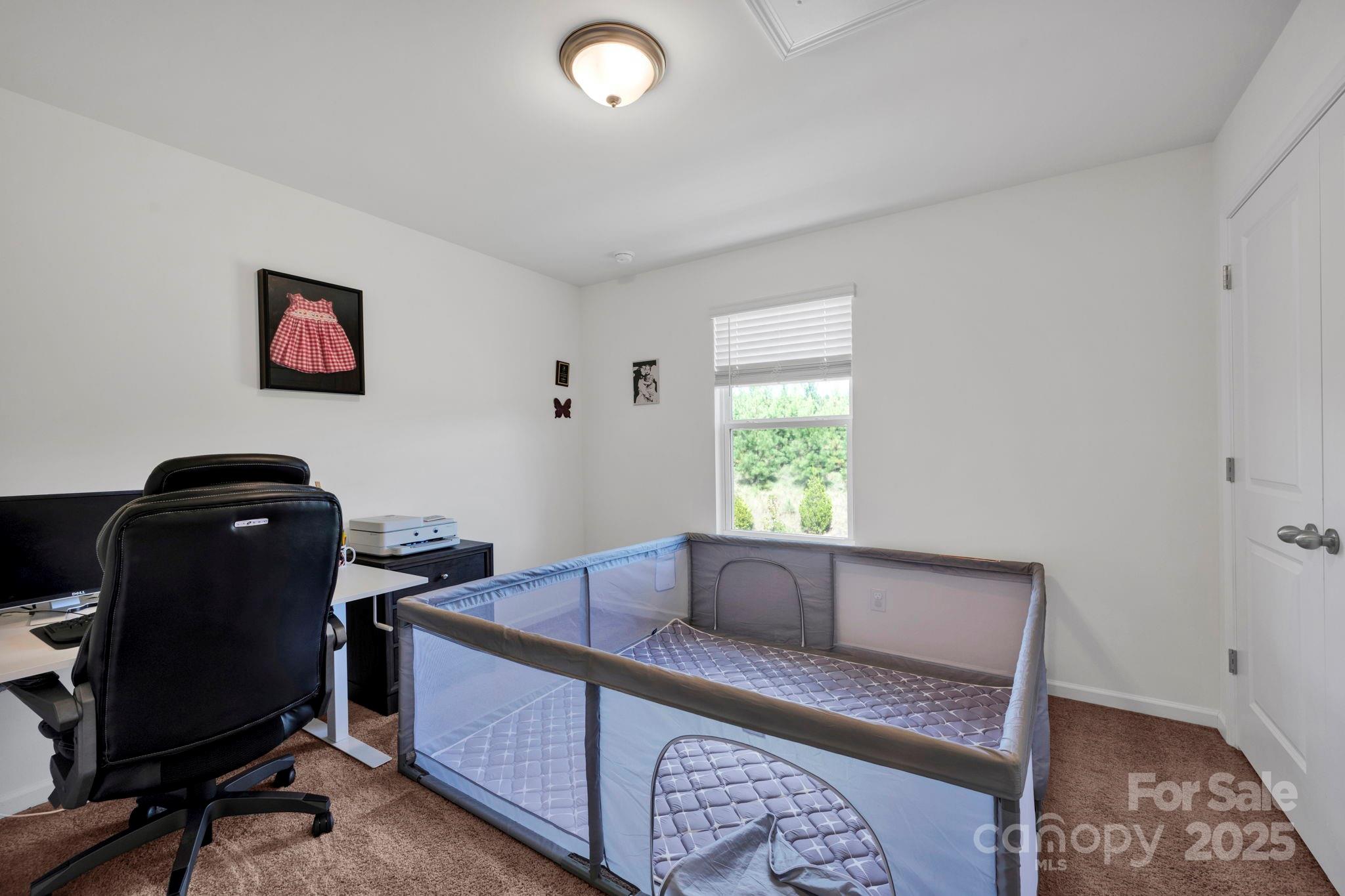 2712 Trinity Street Monroe, NC 28110 - Photo 33 of 48 a living room with furniture and a window