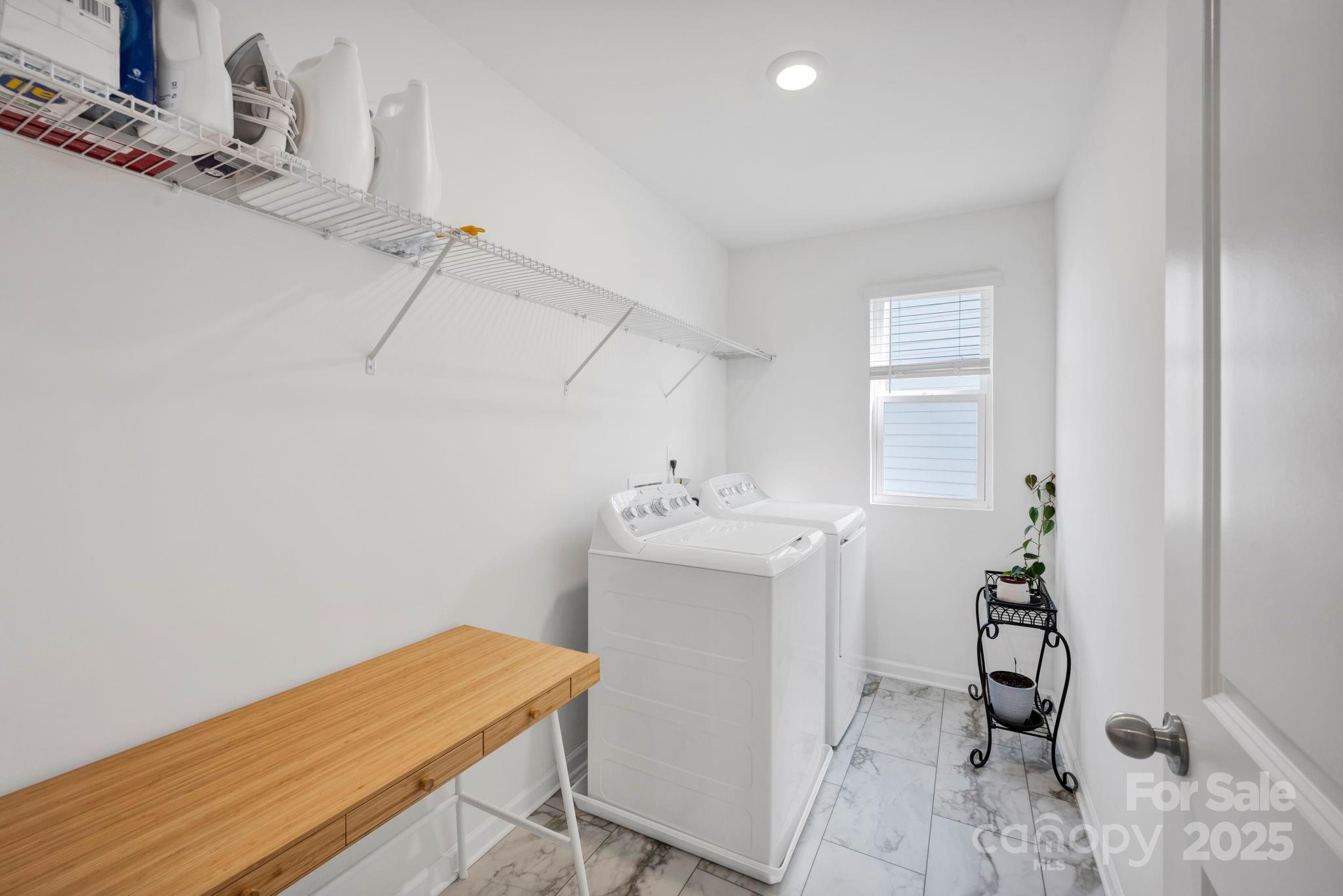 2712 Trinity Street Monroe, NC 28110 - Photo 36 of 48 a utility room with a sink dryer and washer
