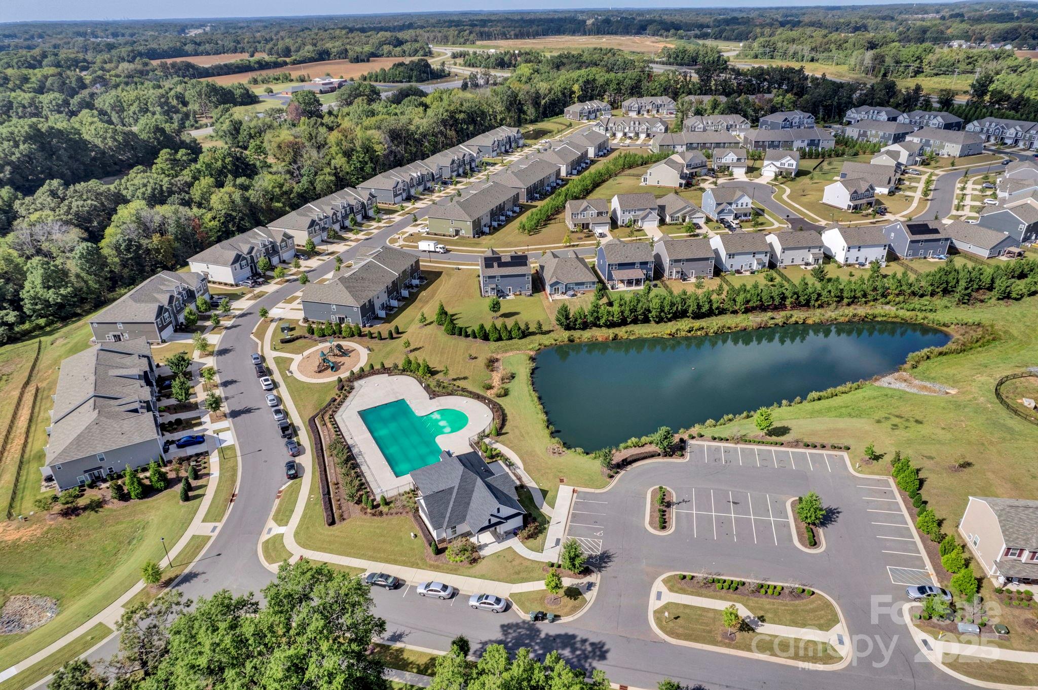 2712 Trinity Street Monroe, NC 28110 - Photo 47 of 48 an aerial view of residential houses with outdoor space