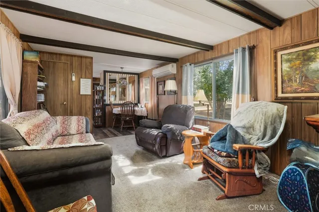 a view of an empty room with a flat screen tv