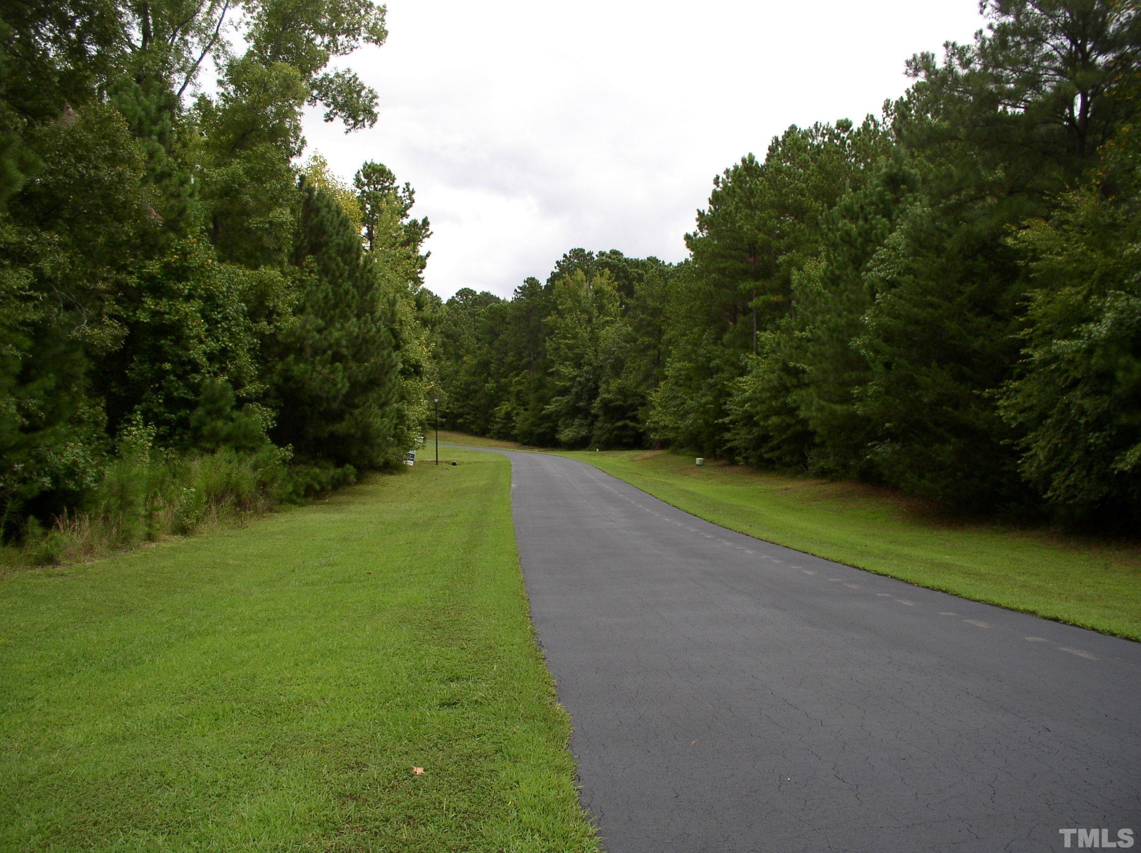 198 B South Harrison Lane Henderson, NC 27537 - Photo 10 of 14 a view of a golf course with a park