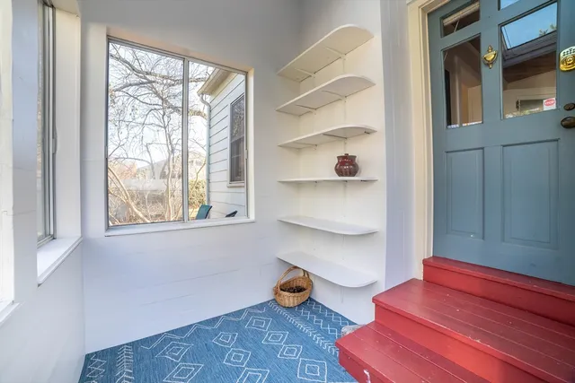 a room with toys and a window