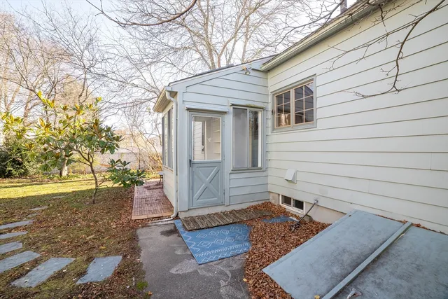 a view of house with backyard
