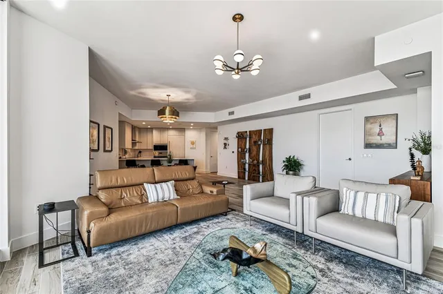 a kitchen with a table and chairs