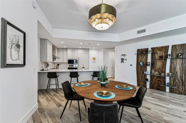 a kitchen with a sink cabinets and window