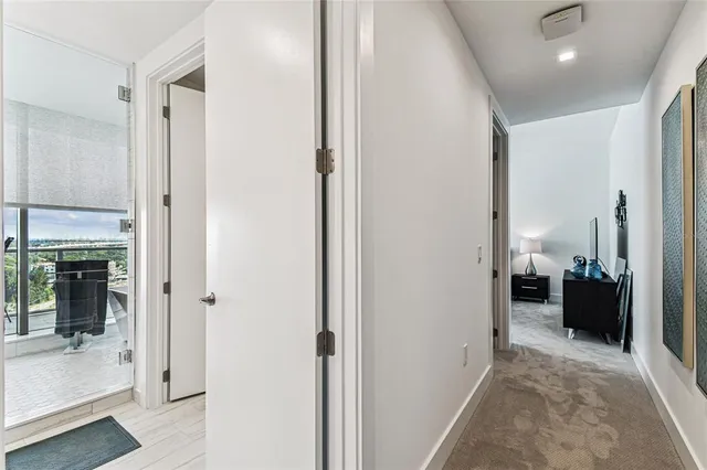 a view of a balcony with chairs